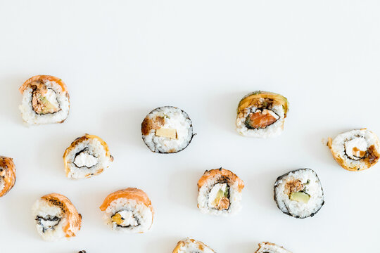 Sushi Rolls Set, maki, philadelphia and california rolls, on a white background.