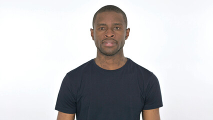 Serious Young African Man Looking at the Camera on White Background