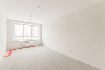 Russia, Moscow- May 21, 2020: interior apartment rough repair for self-finishing. interior decoration, bare walls of the room, stage of construction