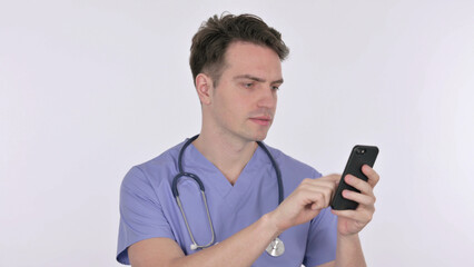 Young Doctor Browsing Smartphone on White Background