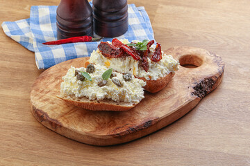 bruschetta with soft cheese capers and tomato