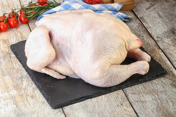 Whole raw chicken for cooking