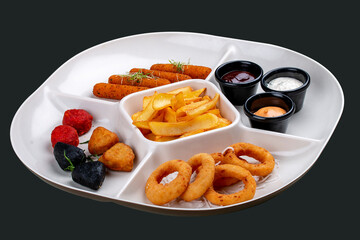 Set of fried beer snacks. Isolated on black background