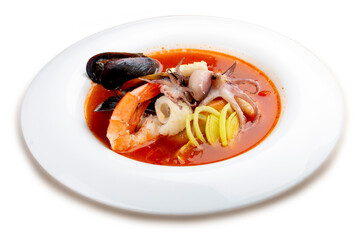 Traditional Marseille Bouillabaisse fish soup with prawns, mussels tomato,lobster, squid.