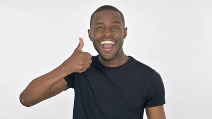 Thumbs Up by Young African Man on White Background