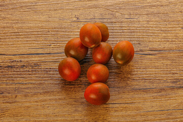 Fototapeta na wymiar Cherry Kumato - black juicy tomato