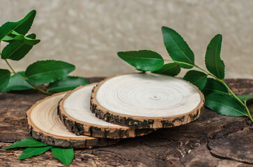 Wooden podium for advertising ecological cosmetic products. Showcase for cosmetic products with...
