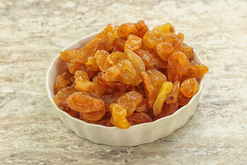 Sweet yellow raisin in the bowl