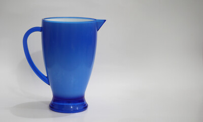 Blue plastic jug utensils