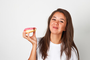 Woman with red donut on white background