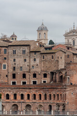 Obraz premium bell tower of the church and rome street architectural historical building in rome city italy with ancient stone and architecture
