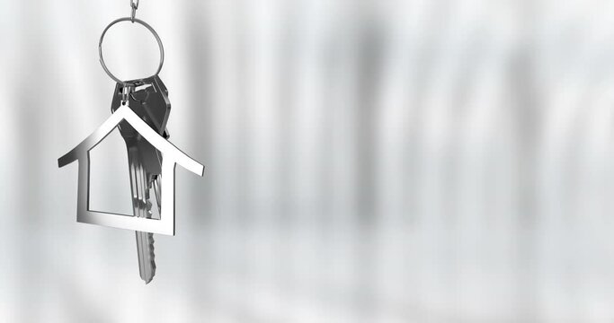 Animation of keys with house keychain over blurred background