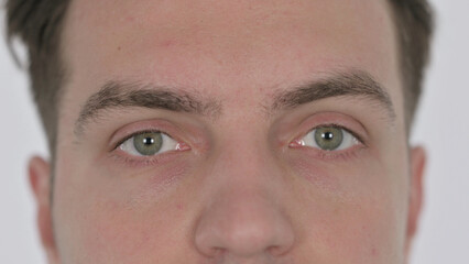 Obraz premium Close up of Blinking Eyes of Young Man