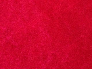 Red velvet fabric texture used as background. Empty red fabric background of soft and smooth textile material. There is space for text.