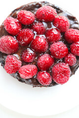 berry dessert. chocolate cheesecake with raspberries and jelly