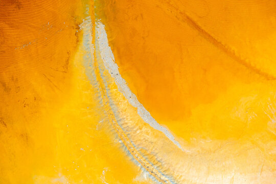 Colorful textures on sandy terrain at mine site in Huelva