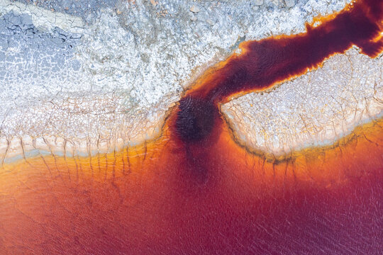 Colorful textures on sandy terrain at mine site in Huelva