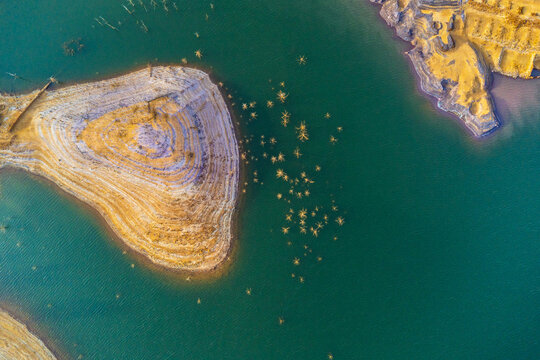 Reservoir and rocky cliffs in mining park in Spain