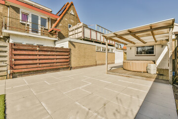 Backyard of a house with transparent roof and portable pool