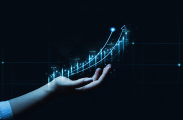 Business person holding arrow up with graph of business analysis. Business development, financial...