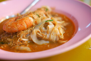 Noodle soup with shrimp on a plate