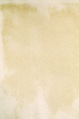 Old yellowed kraft paper with white stains