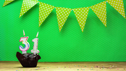 happy birthday with decorations festive garlands with muffin on a green background with polka dots....