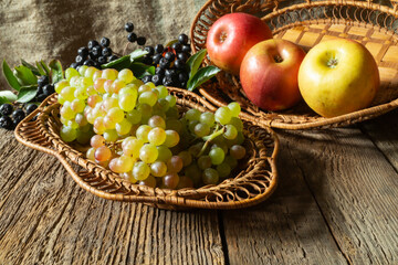 Ripe fruits and berries on a wooden table
