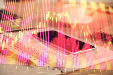 Double exposure of forex chart drawing and cell phone background. Concept of financial data analysis