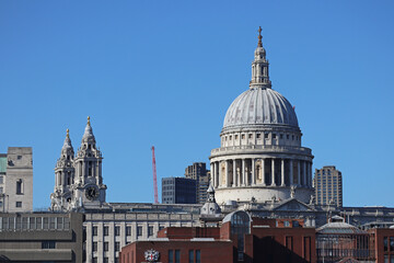 Fototapeta na wymiar London, United Kingdom - 11.08.2022 : View of St. Paul's Cathedral, seen from across the Thames