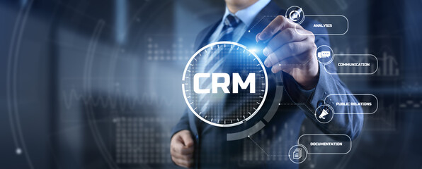 Fototapeta na wymiar CRM Customer relationship management concept. Businessman pressing button on screen.