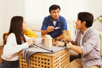 Fathers convene to encourage sons and daughters to save their cash and coins in order to plan...