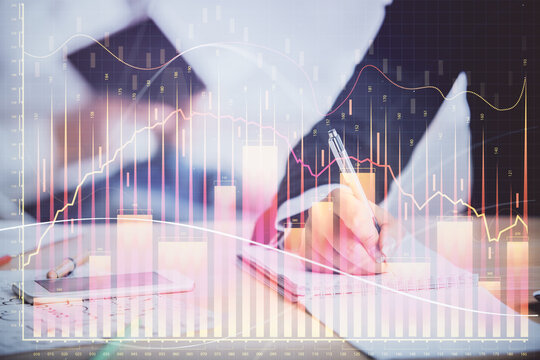 Double exposure of forex chart drawing over people taking notes background. Concept of financial analysis