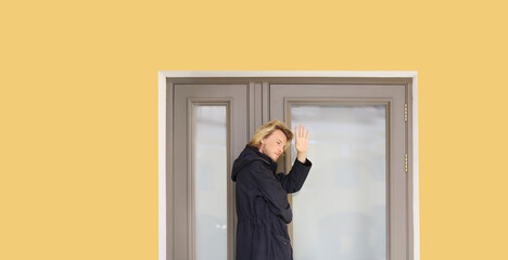 young man opening the door of his house.Inviting the guests