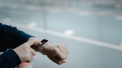 Close-up on smart watch wear on wrist screen show heartbeat tracking technology for health checking...