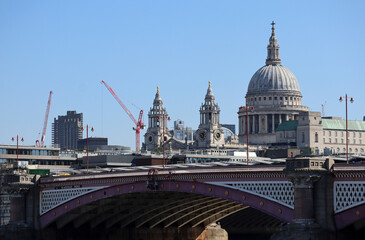 Fototapeta premium View of the City of London across the Thames on a sunny day