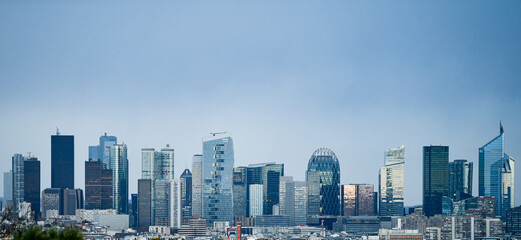 Panoramic view of the skyline of the financial district of La Défense, Paris, France (day time)...