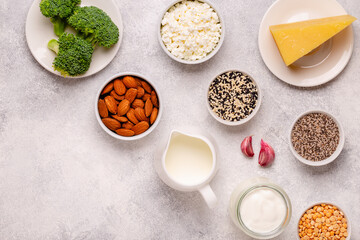 Products rich in calcium on light background.
