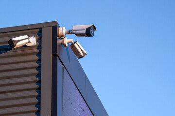 A review of surveillance cameras on white background. Security concept. Facial recognition. Program...