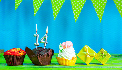 Happy birthday colorful background with decorations with festive garlands with pies and muffins and...