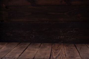 Wooden table and dark wooden wall, cooking background