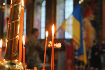 Flaming candles at the funeral ceremony indoor
