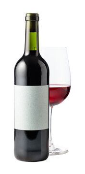 Bottle and glass of red wine are isolated on white.
