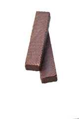 closeup the pair of dark brown color snack chocolate block soft focus natural white brown background.