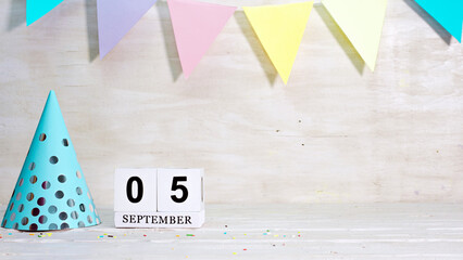 Birthday September 5 on the calendar. Happy birthday card with date copy space. Holiday decorations for congratulations, place for text.