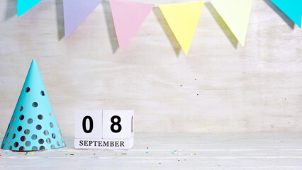 Birthday September 8 on the calendar. Happy birthday card with date copy space. Holiday decorations...