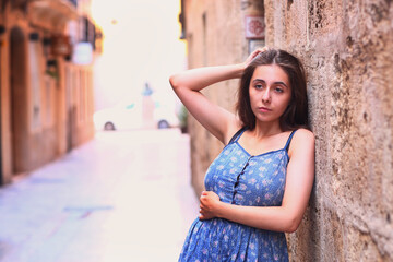 teenager girl close up street portrait in Spanish downtown line