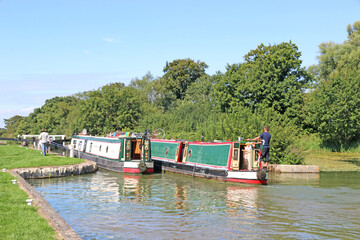 	
Narrow boats in the Caen Hill canal locks, Devizes, England	