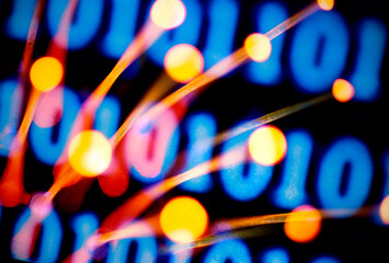 Fiber optics with binary code in the back ground