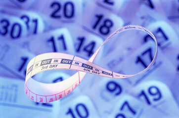 Close-up of a calendar on a strip of paper
